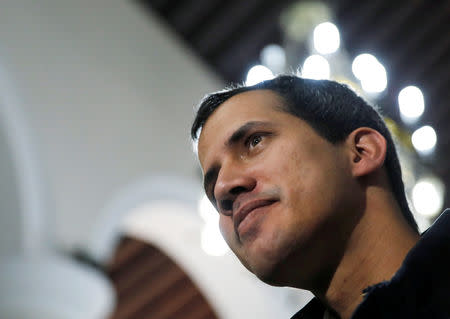 FILE PHOTO: Venezuelan opposition leader and self-proclaimed interim president Juan Guaido arrives to attend a holy mass in Caracas, Venezuela, January 27, 2019. REUTERS/Carlos Barria/File Photo