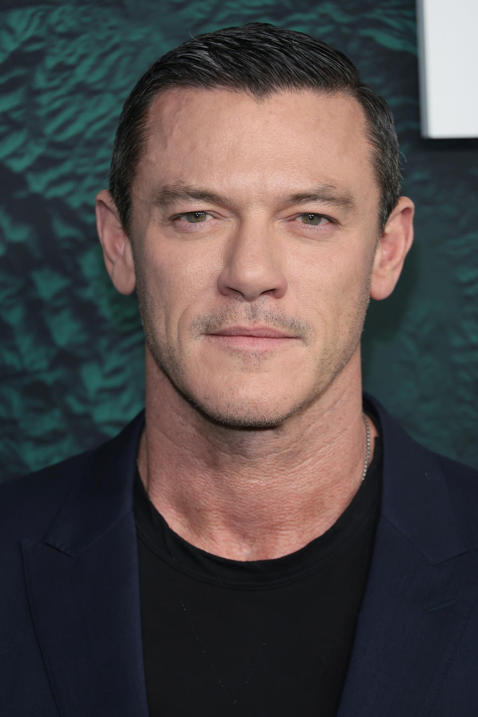 Luke Evans is close to his parents and was delighted to pay off their mortgage for them. (Getty Images)