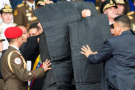 <p>Security members protect Venezuelan President Nicolas Maduro after his speech was interrupted in Caracas, Venezuela, on Aug. 4, 2018. Venezuela’s Minister of Communication Jorge Rodriguez confirmed on Saturday night an attempted attack against President Nicolas Maduro. The attack happened during a speech by Maduro commemorating the 81st anniversary of the country’s National Guard. (Photo: Xinhua via ZUMA Wire) </p>