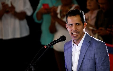 Venezuelan opposition leader Juan Guaido, who America has recognised as the country's rightful interim ruler - Credit: REUTERS/Marco Bello