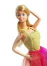 <p>Though she's been a model in every decade, the 1977 Fashion Model Barbie is a favorite for her colorful ensemble. </p>