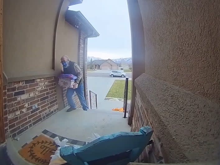 Jen Cantell Weiss shared footage on her Facebook earlier this month of the delivery driver struggling to walk up the steps to her home in Ogden, Utah (Jen Cantwell Weiss/ Facebook)