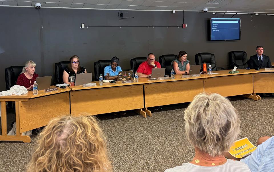 The Bremerton School Board meets in a special session on Thursday, July 4. The board voted to place Superintendent James Crawford, at right, on administrative leave, and acknowledged an investigation into conduct and workplace culture at the district office under his leadership.