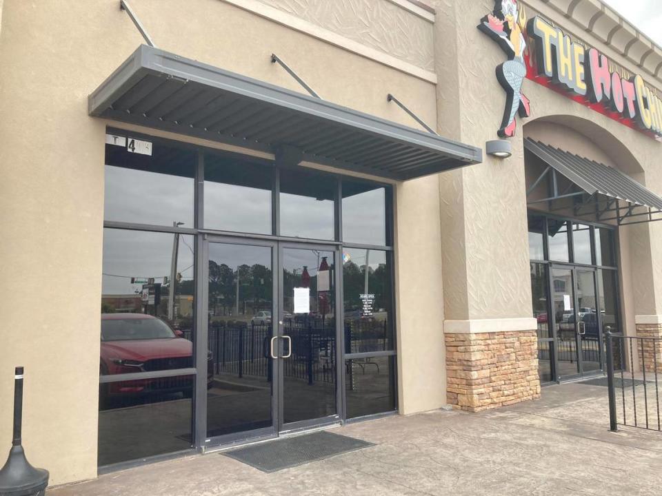 The Hot Chik at 670 Lake Joy Road, Suite 400, in Warner Robins closes its doors permanently. A notice from the restaurant owners about the closure is taped to the front door.