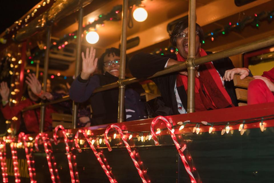 The Poinsettia Christmas Parade draws thousands of people to downtown Greenville each December.