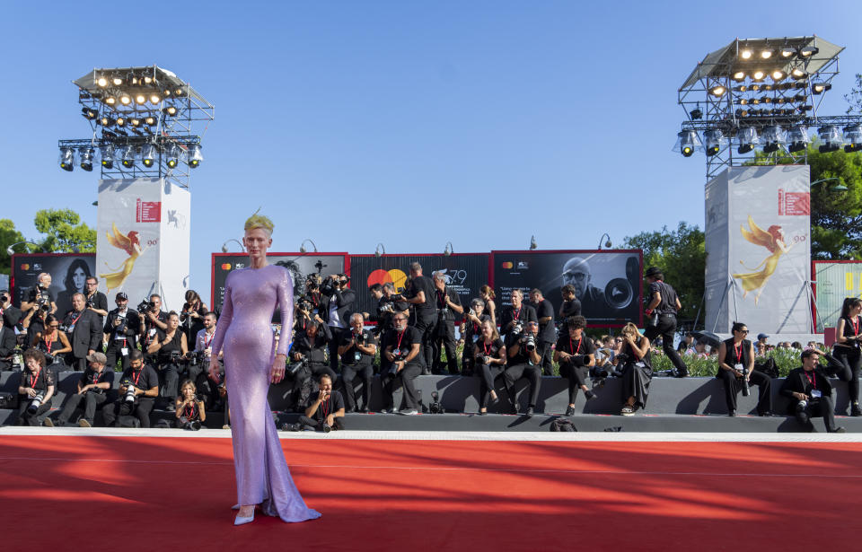 Tilda Swinton poses for photographers upon arrival at the premiere of the film 'The Eternal Daughter' during the 79th edition of the Venice Film Festival in Venice, Italy, Tuesday, Sept. 6, 2022. (AP Photo/Domenico Stinellis)