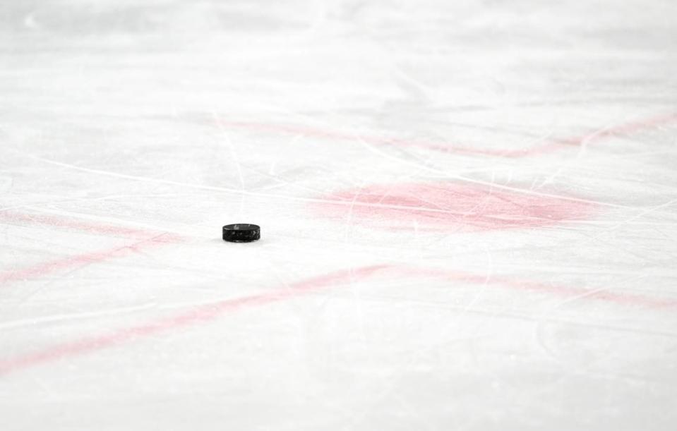 A puck on the ice during State College middle school secondary hockey team practice on Friday, March 17, 2023.