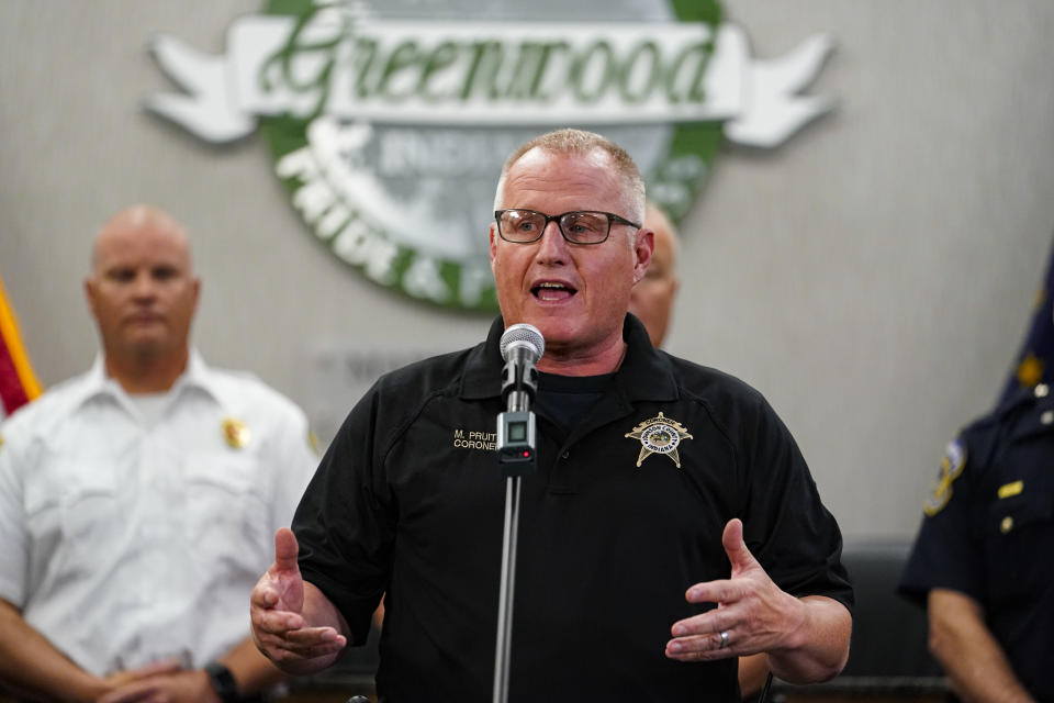 Johnson County Coroner Michael Pruitt speak during a press conference at the Greenwood City Center in Greenwood, Ind., Monday, July 18, 2022. Police say three people were fatally shot and two were injured, including a 12-year-old girl, after Jonathan Douglas Sapirman, 20, opened fire with a rifle in a food court and an armed civilian shot and killed him. (AP Photo/Michael Conroy)