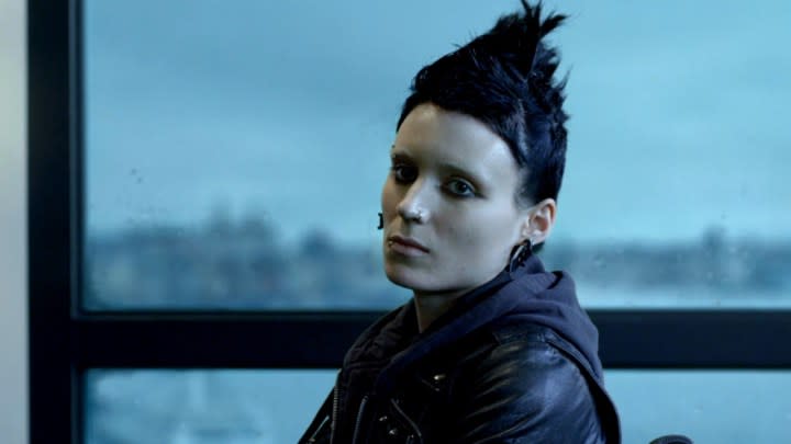 A woman looks to her left in The Girl with the Dragon Tattoo.