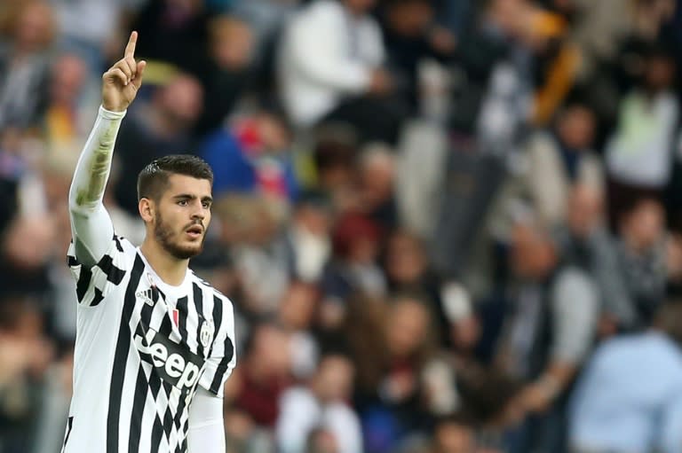 Juventus' forward Alvaro Morata celebrates after scoring during an Italian Serie A football match against Bologna on October 4, 2015