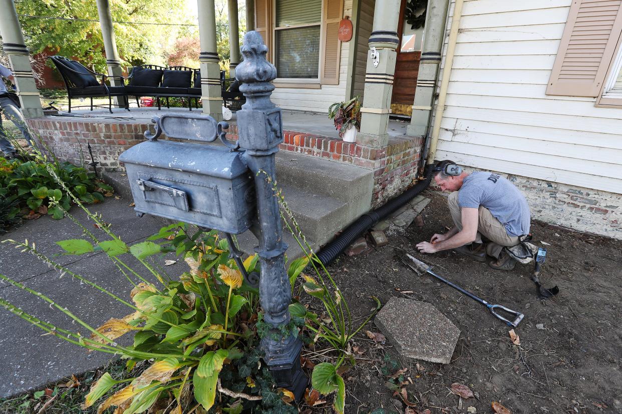 Kentucky Dirt Digger Zeb Hargis searches his brother's property for precious metals in Henderson, Ky. on Oct. 23, 2023. The business has generated a growing social media following.