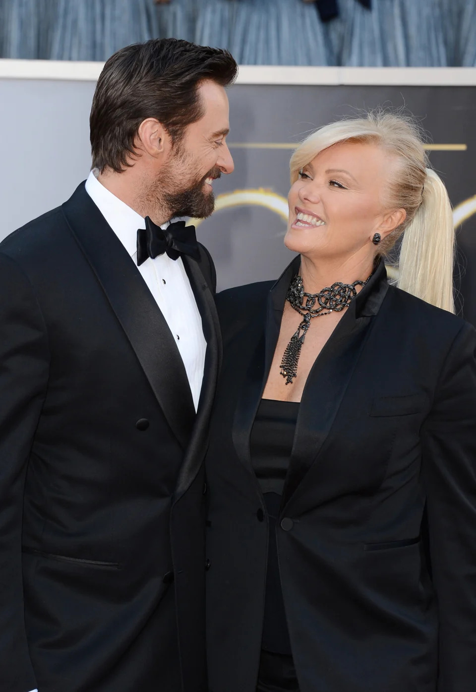 Hugh Jackman and Deborra-Lee Furness smile at each other