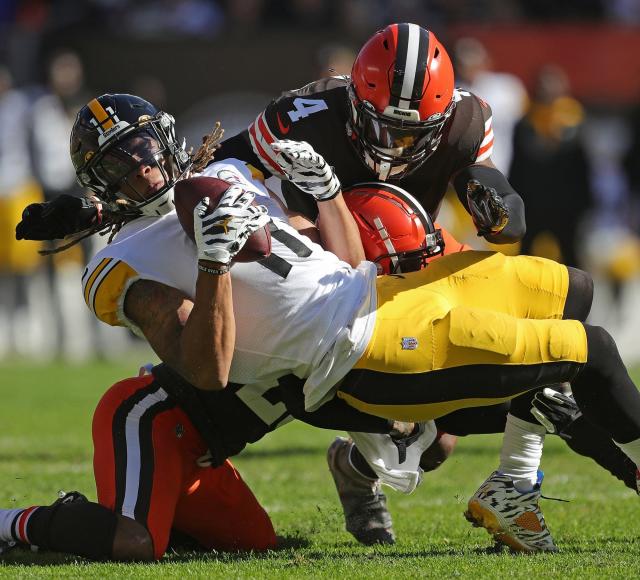 Pittsburgh Steelers wide receiver Chase Claypool (11) walks out to midfield  following a 48-37 loss to the Cleveland Browns during an NFL wild-card  playoff football game, Sunday, Jan. 10, 2021, in Pittsburgh. (