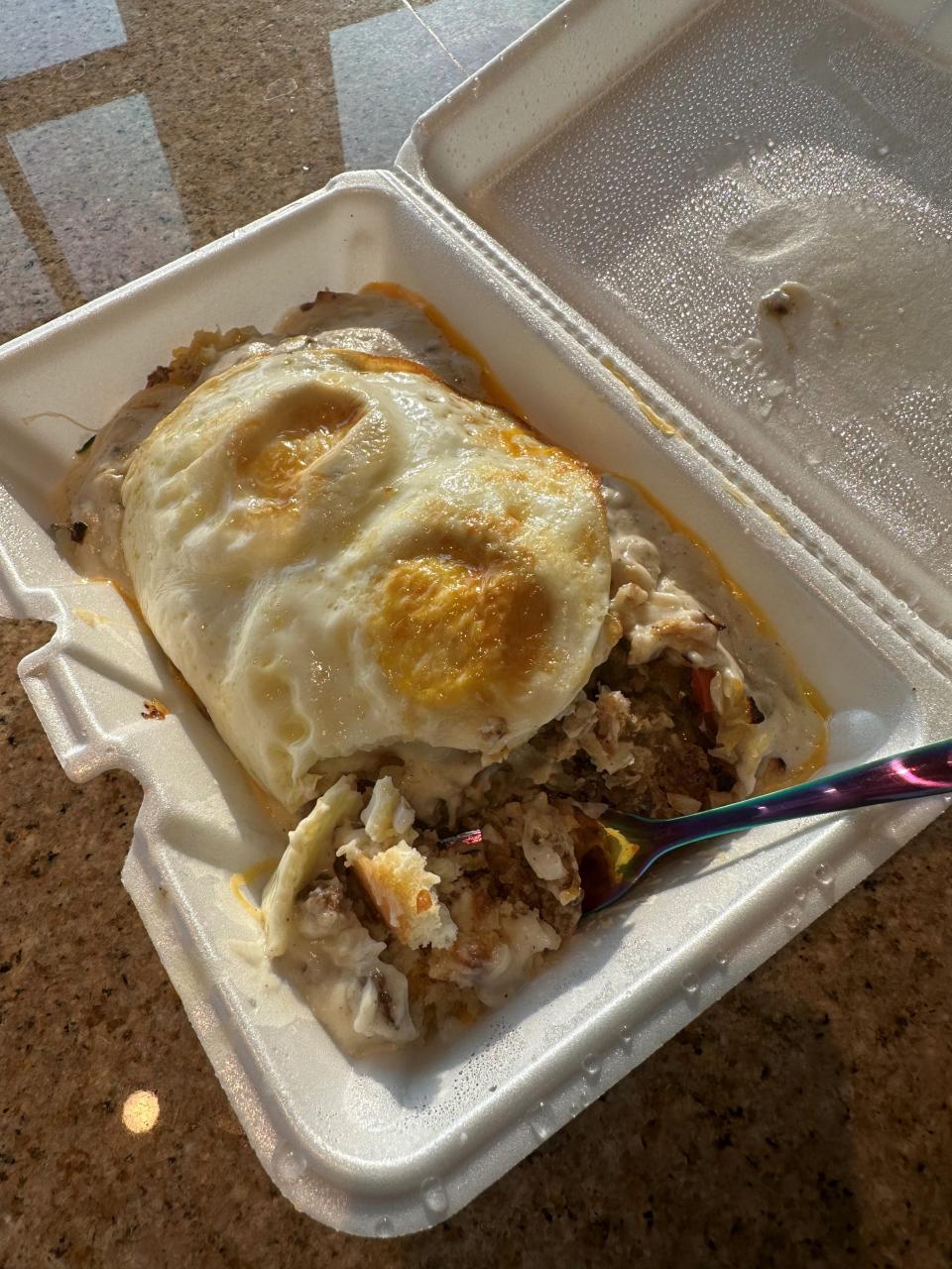 The hangover bowl from Price Hill Chili  includes a generous portion of eggs, home fries, biscuits, gravy, cheese, and your choice of meat. That choice should be goetta, if you know what's good for you.