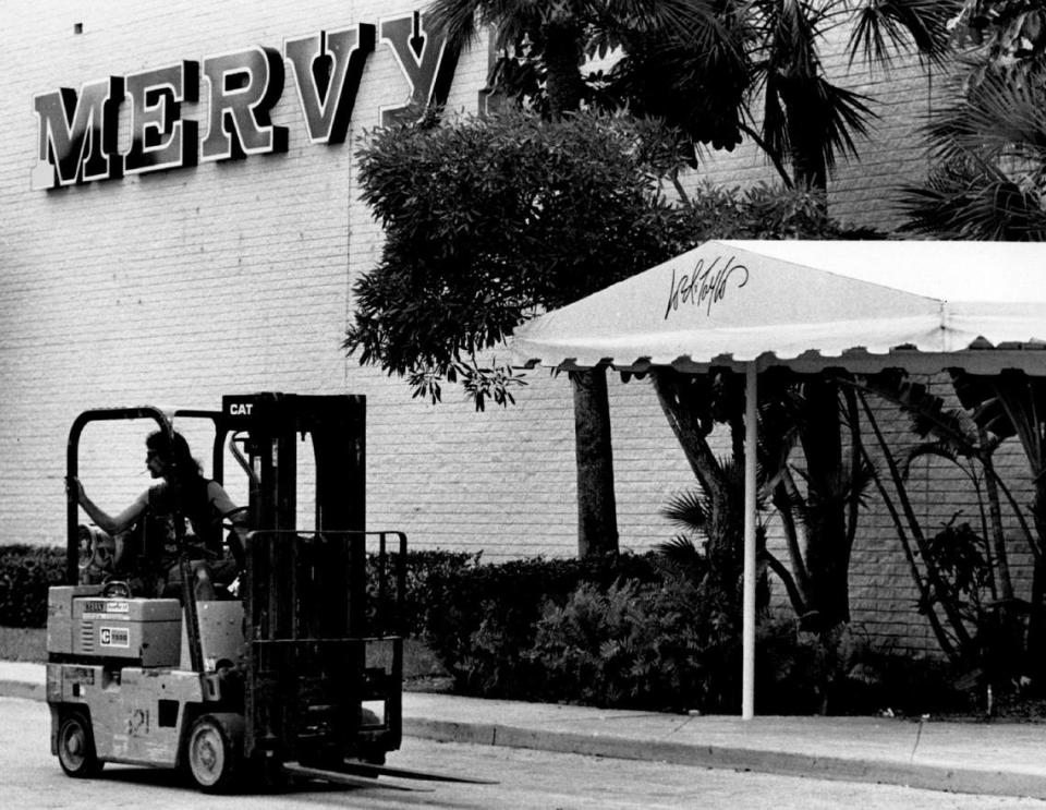 A Mervyn’s sign goes up at a former Lord & Taylor location.