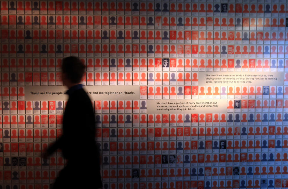 A visitor to SeaCity Museum looks at a board showing the number of Titanic crew lost at the museum's Titanic exhibition on April 3, 2012 in Southampton, England. The new SeaCity Museum, which will open at 1.30pm on April 10, 100 years to the day since the Titanic set sail from the city. The museum, which cost 15 GBP million, promises to tell the largely untold story of Southampton's Titanic crew and the impact the tragedy had on the city, as well as featuring other aspects of the city's seafaring past. (Photo by Matt Cardy/Getty Images)