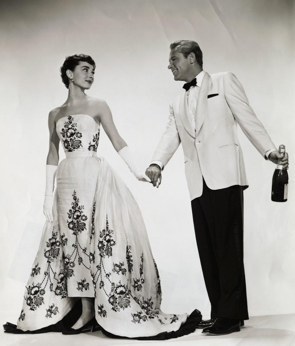 <p>When Audrey Hepburn's character in <em>Sabrina </em>returned to her childhood home as a stunning ingénue, she was outfitted with an entirely new couture wardrobe, including this striking embroidered black-and-white evening gown. </p>