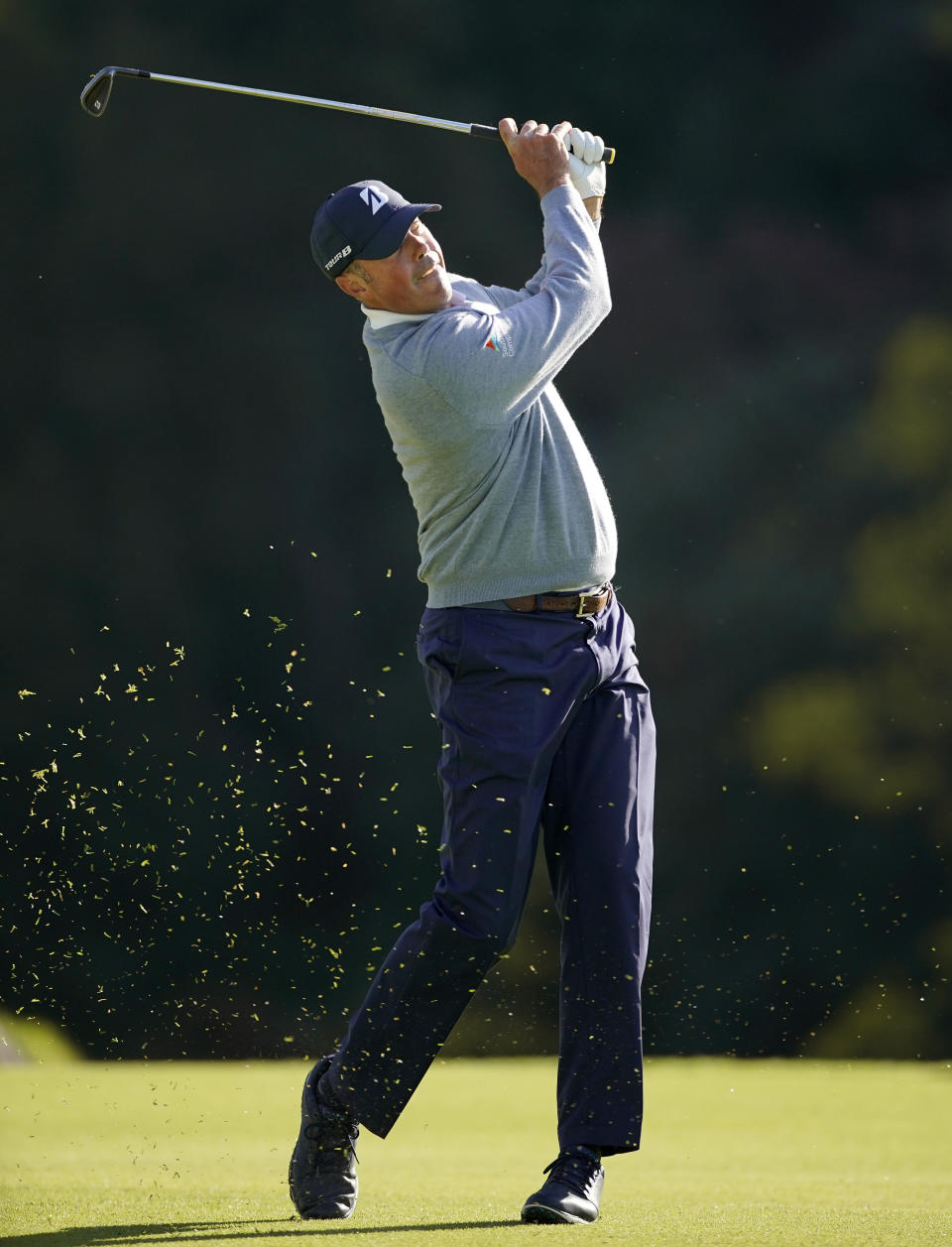 Matt Kuchar hits his second shot on the 13th hole during the first round of the Genesis Invitational golf tournament at Riviera Country Club, Thursday, Feb. 13, 2020, in the Pacific Palisades area of Los Angeles. (AP Photo/Ryan Kang)