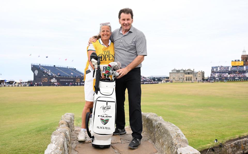 Sir Nick Faldo of England poses for a photo alongside Caddie Fanny Sunesson - GETTY IMAGES