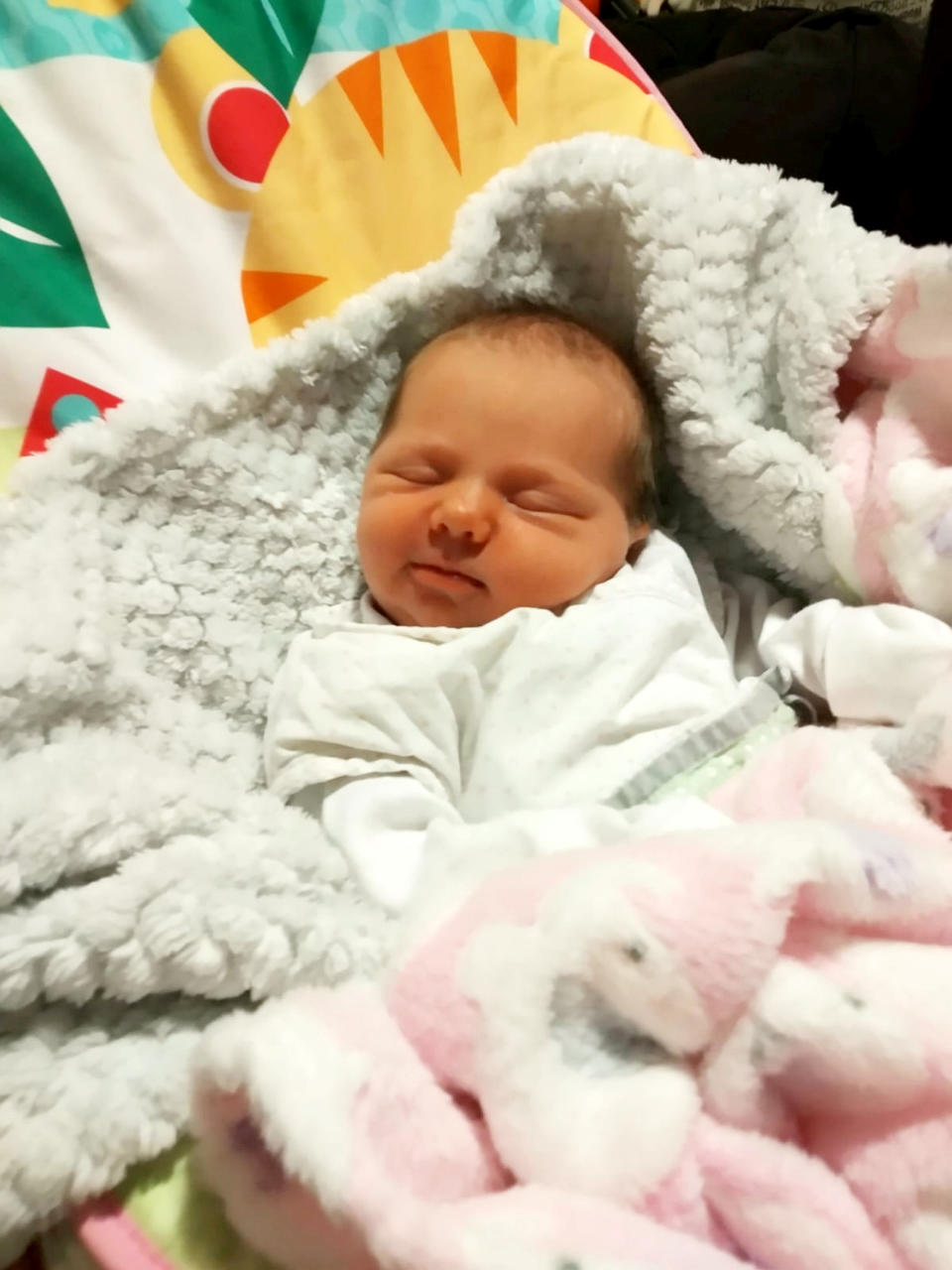 Baby Alice Lister whilst in hospital after being born in the camper van. (SWNS)