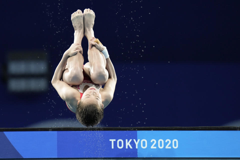 FILE - Quan Hongchan of China competes in women's diving 10-meter platform final at the 2020 Summer Olympics, on Aug. 5, 2021, in Tokyo, Japan. Chinese divers are focused on winning all eight gold medals at the Paris Olympics. The Chinese have dominated the sport for decades but have never won every gold medal in diving in a single Olympics. (AP Photo/Alessandra Tarantino, File)