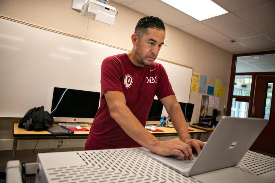 Downey High soccer coach Marvin Mires continues to coach his team on and off the field Oct. 30, 2020.