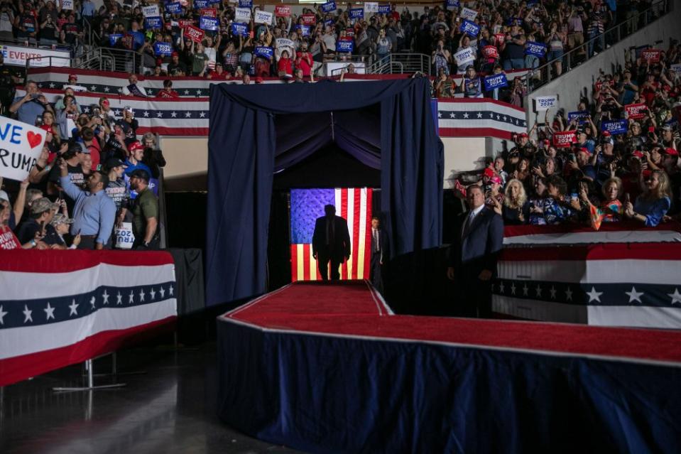 Former President Donald Trump takes the stage at a rally in Erie, Pa. on July 29.<span class="copyright">Maddie McGarvey—The New York Times/Redux</span>