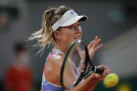 Ukraine's Elina Svitolina plays a shot against Mexico's Renata Zarazua in the second round match of the French Open tennis tournament at the Roland Garros stadium in Paris, France, Wednesday, Sept. 30, 2020. (AP Photo/Christophe Ena)