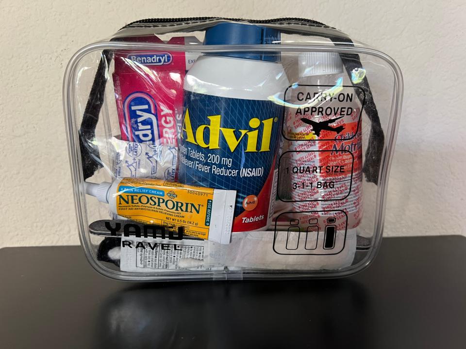 first-aid kit with over the counter medicine inside