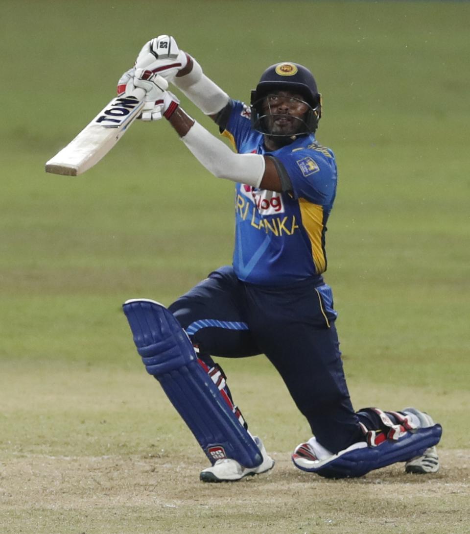 Sri Lanka's Bhanuka Rajapaksa plays a shot during the third one day international cricket match between Sri Lanka and India in Colombo, Sri Lanka, Friday, July 23, 2021. (AP Photo/Eranga Jayawardena)