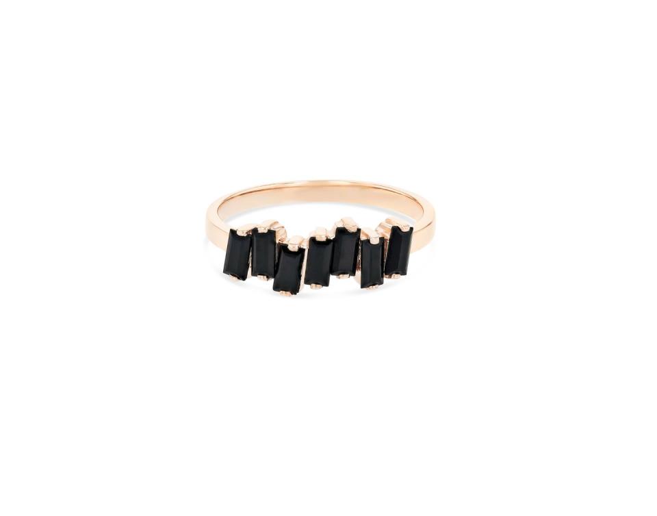 <p>The perfect accessory for everyday, these black spinel baguettes feel luxurious yet understated. </p><p>Rose gold and black spinel ring, about £335, Suzanne Kalan</p><p><a class="link " href="https://suzannekalan.com/collections/14k-rings/products/black-spinel-amalfi-wave-band-rg" rel="nofollow noopener" target="_blank" data-ylk="slk:SHOP NOW;elm:context_link;itc:0;sec:content-canvas">SHOP NOW</a></p>