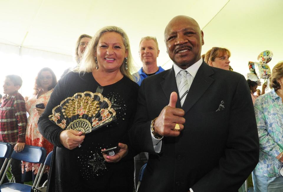 In this June 1, 2018, file photo, Brockton boxing legend Marvelous Marvin Hagler, right, and wife Kay G. Hagler attend Massasoit Community College's 51st commencement ceremony.