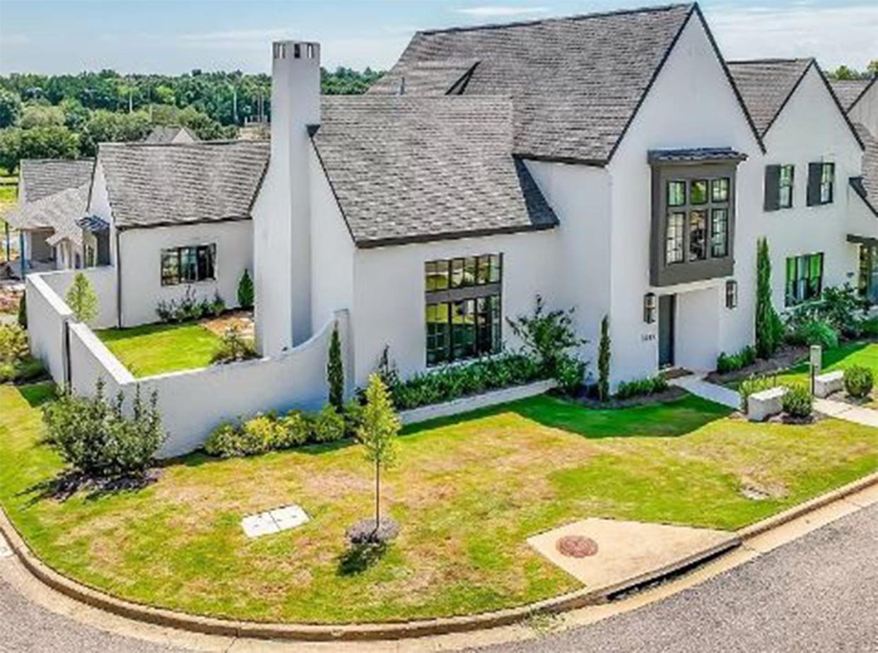 A two-story home for sale at 7085 Fain Park Drive in Wynhurst was built in 2020 and provides 3,800 square feet of living space. The property is listed at $699,000. The design includes five bedrooms, five baths, and a five-car garage, all on a corner lot.