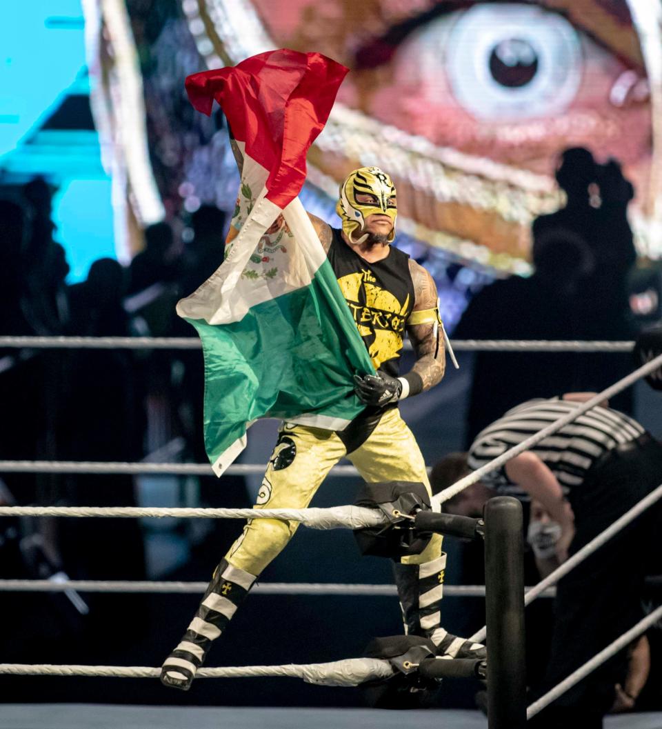 Rey Mysterio acknowledges his fans before the start of his match on Saturday, Dec. 18, 2021, at the BMO Harris Bank Center in Rockford.