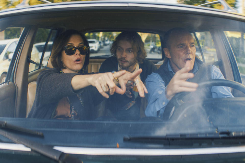 This image released by Magnolia Pictures shows Parker Posey, from left, Fred Hechinger and Clark Gregg in a scene from the film "Thelma." (Magnolia Pictures via AP)