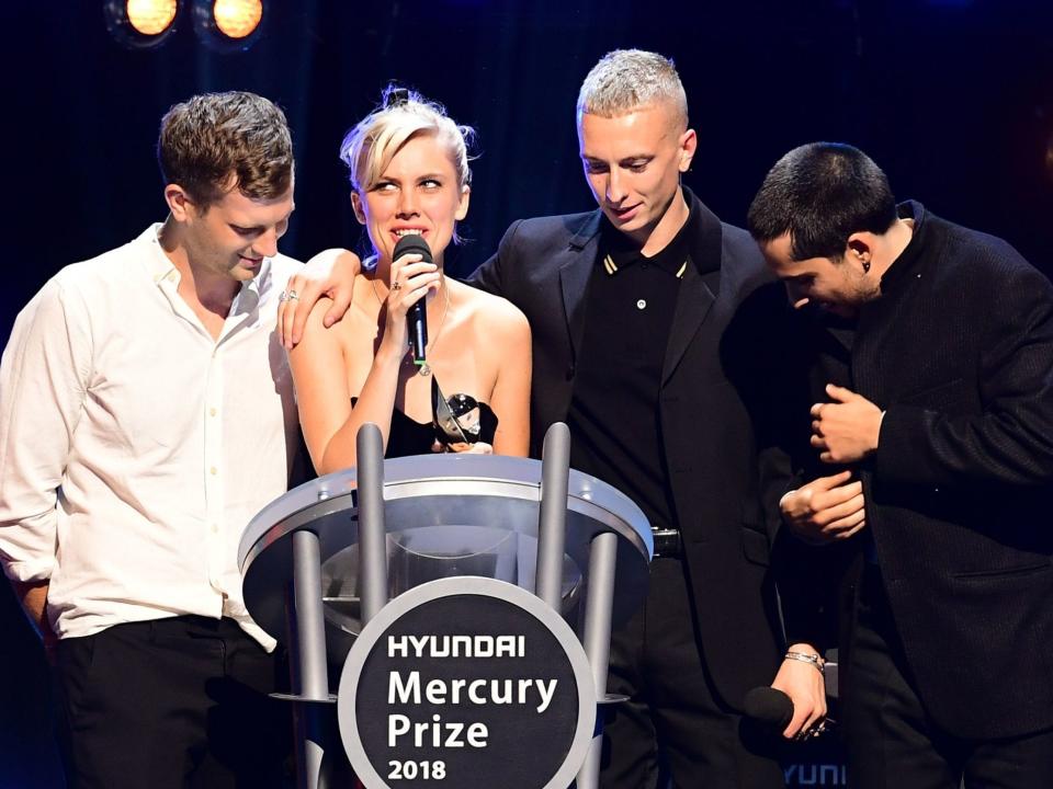 Wolf Alice accepting their Mercury Prize for ‘Visions of a Life’ (PA)
