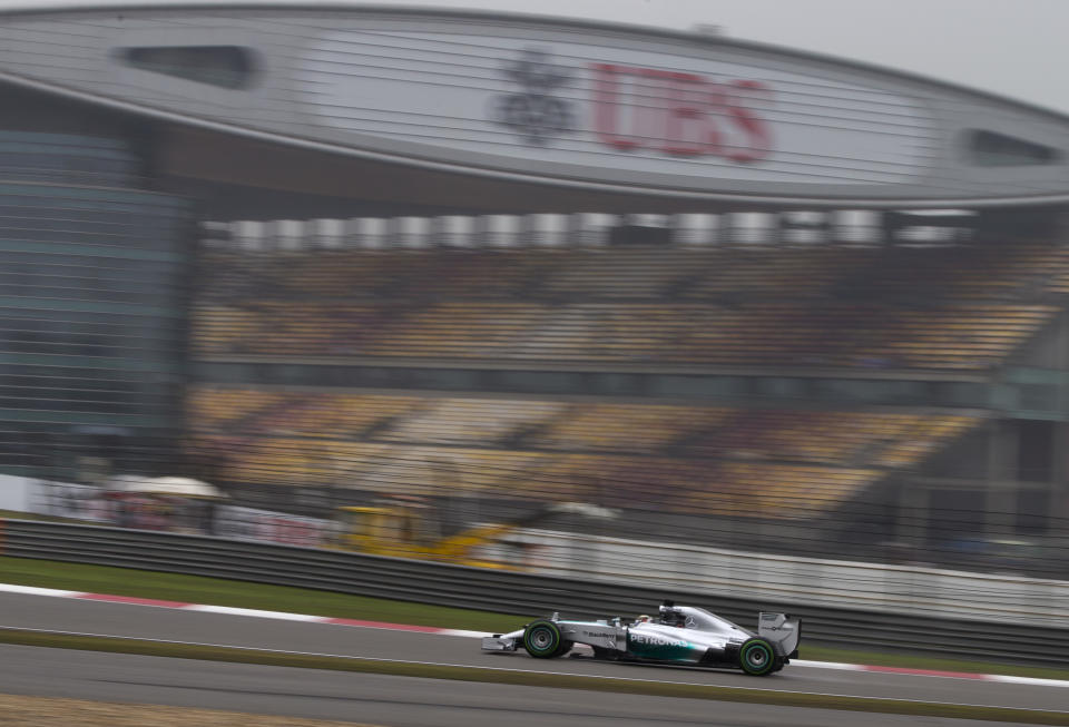 Mercedes driver Lewis Hamilton of Britai10drives during his practice session for Sunday's Chinese Formula One Grand Prix at Shanghai International Circuit in Shanghai, China Saturday, April 19, 2014. (AP Photo/Andy Wong)