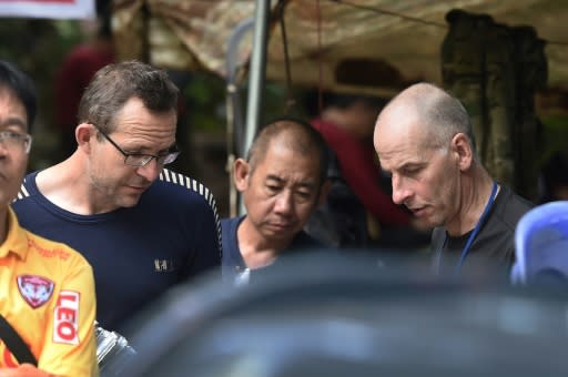 British divers John Volanthen, left, and Richard Stanton have been awarded Britain's George Medal for helping save a junior football team stranded in a flooded cave in Thailand