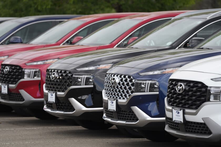 FILE - A line of 2022 Santa Fe SUV's sit outside a Hyundai dealership Sunday, Sept. 12, 2021, in Littleton, Colo. Hyundai Motor America and Kia America will resolve class-action lawsuit prompted by a surge in vehicle thefts with a settlement agreement that could be valued at $200 million, the automakers announced Friday, May 19, 2023. (AP Photo/David Zalubowski, File)