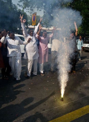 Supporters of Pranab Mukherjee set off fireworks as they celebrate outside his residence in New Delhi. Mukherjee was elected Indian president after votes from national and state lawmakers were counted in the race for the mainly ceremonial post