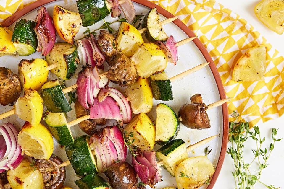 <p>These kabobs have the *perfect* combination of flavors and textures. Serve them up with our ultimate <a href="https://www.delish.com/cooking/recipe-ideas/a27394588/quinoa-burger/" rel="nofollow noopener" target="_blank" data-ylk="slk:meat-lovers veggie burger;elm:context_link;itc:0;sec:content-canvas" class="link ">meat-lovers veggie burger</a> for a backyard vegetarian feast that even a carnivore couldn't turn down.</p><p>Get the <strong><a href="https://www.delish.com/cooking/recipe-ideas/a32675717/veggie-kabobs/" rel="nofollow noopener" target="_blank" data-ylk="slk:Veggie Kabobs recipe;elm:context_link;itc:0;sec:content-canvas" class="link ">Veggie Kabobs recipe</a></strong>.</p>