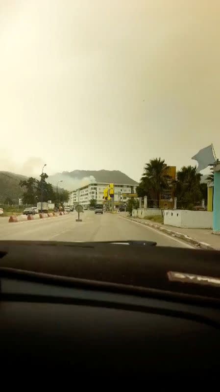 Smoke rises following a wildfire in Bejaia