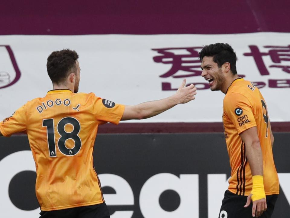 Jota and Jimenez celebrate vs Burnley: Getty