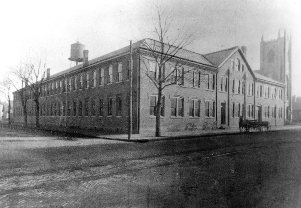 An early photo of the "new shoe factory" on N. Columbus St. just north of the First English Lutheran Church circa 1900.