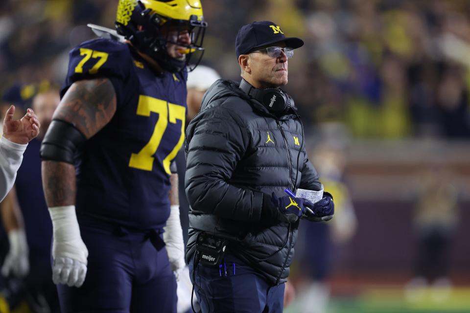 Head coach Jim Harbaugh looks on in the second half while playing the Purdue Boilermakers at Michigan Stadium on November 04, 2023 in Ann Arbor, Michigan.