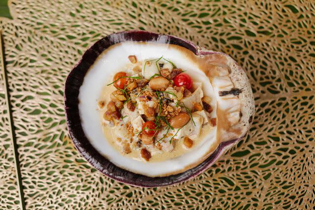 <p>Rose Marie Cromwell</p> Rock oyster ceviche with fresh peanuts, wild tomatoes, chicharrones, and mountain coriander at Bocavaldivia.