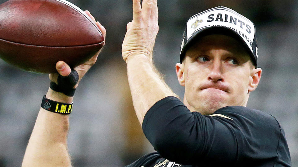 New Orleans Saints quarterback Drew Brees is pictured warming up before a game.