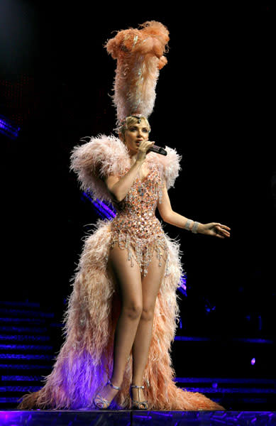 <b>Kylie on her Showgirl tour, 2006</b><br><br>Resuming her tour after overcoming breast cancer, Kylie proved to the world that she is the No1 showgirl in this cabaret style costume dress with nude fishnets.