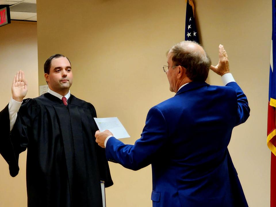 Taylor County Judge Phil Crowley was sworn in Sunday afternoon by 350th District Court Judge Thomas Wheeler. Several county officials were sworn in, some returning, some new, at the start of the new year.