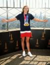 <p>Olympic medalist Katie Ledecky wears her medals on the top of the Empire State Building on Aug. 12 in N.Y.C.</p>